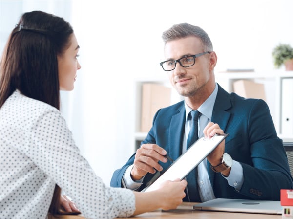insurance rep meeting clients at their home